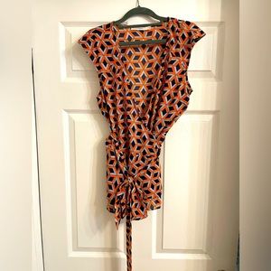 Lucy Paris. Navy/Burnt Orange deep V neck Blouse